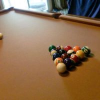 Pool Table with Pool Cues, Cue Hangers, Balls
